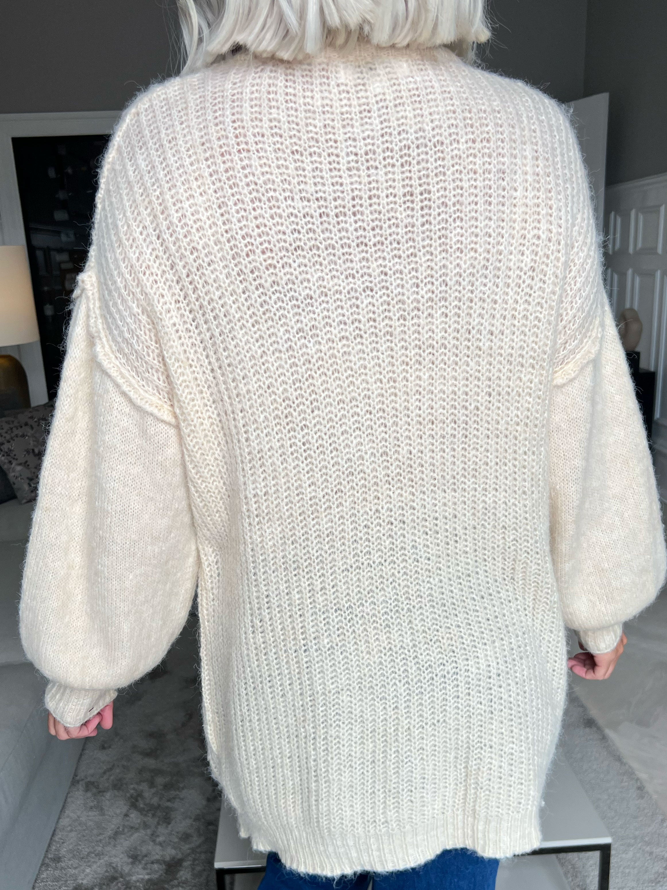 Leana - Lang blød strikbluse med ballonærmer